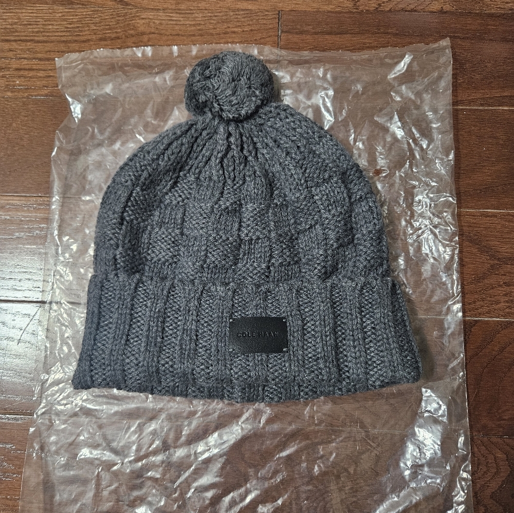 Cole Haan grey knit beanie with pom pom